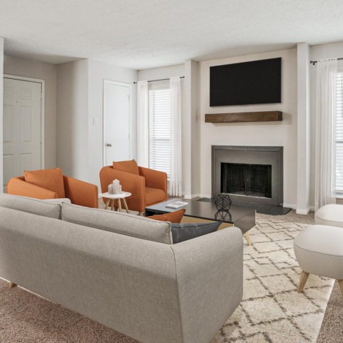 a living room with a fireplace