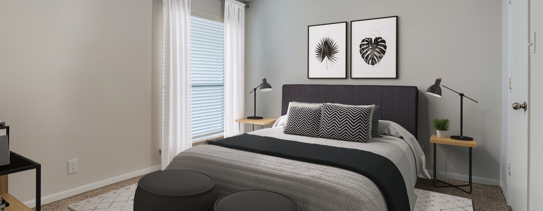 a bedroom with a fan and a bed