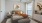 a bedroom with a bed and a fan